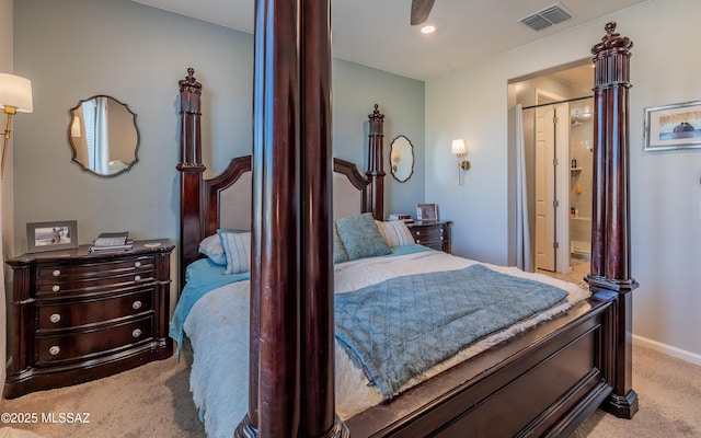 10199 S Pantano Knolls Dr, Vail, AZ 85641 - carpeted bedroom with connected bathroom, baseboards, and visible vents