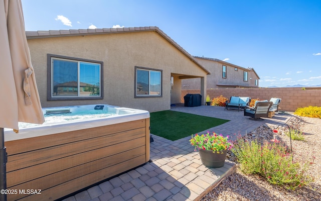 10199 S Pantano Knolls Dr, Vail, AZ 85641 - view of patio with outdoor lounge area, a hot tub, and fence