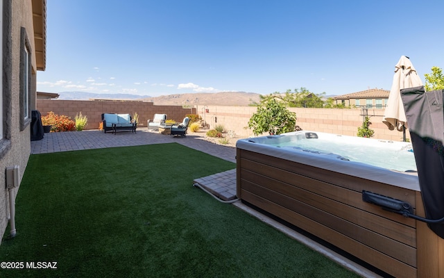 10199 S Pantano Knolls Dr, Vail, AZ 85641 - view of yard featuring a patio, a fenced backyard, a hot tub, and a mountain view