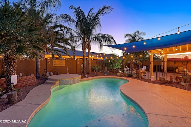 9949 N Blue Crossing Way, Tucson, AZ 85743 - view of swimming pool featuring a fenced backyard and a patio area