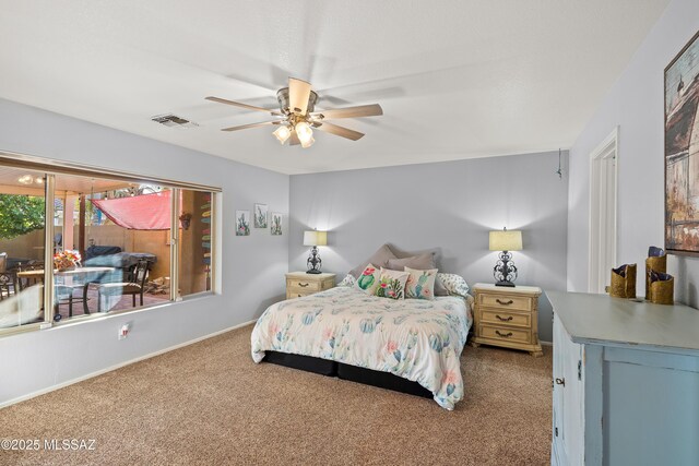 9949 N Blue Crossing Way, Tucson, AZ 85743 - bedroom with carpet, a ceiling fan, and baseboards