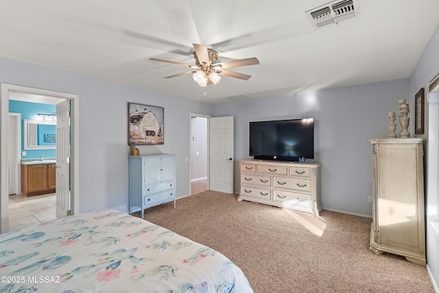 9949 N Blue Crossing Way, Tucson, AZ 85743 - bedroom with a sink, baseboards, a ceiling fan, and light carpet