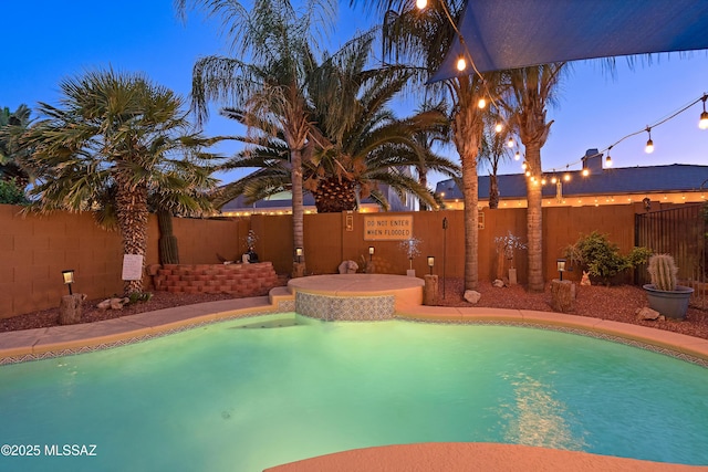 9949 N Blue Crossing Way, Tucson, AZ 85743 - view of swimming pool featuring a fenced backyard and an area to practice putting