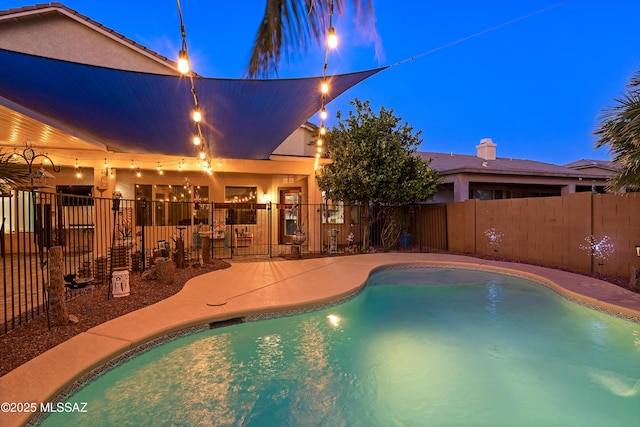 9949 N Blue Crossing Way, Tucson, AZ 85743 - view of swimming pool featuring fence