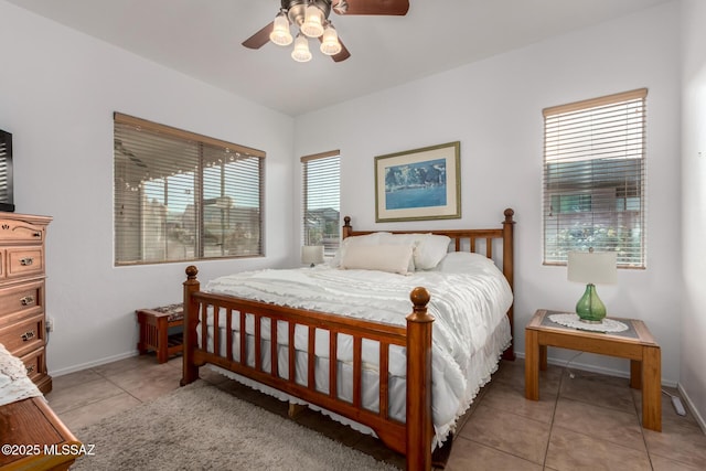 5884 S Azure Vista Way, Green Valley, AZ 85622 - bedroom featuring light tile patterned flooring, baseboards, and ceiling fan