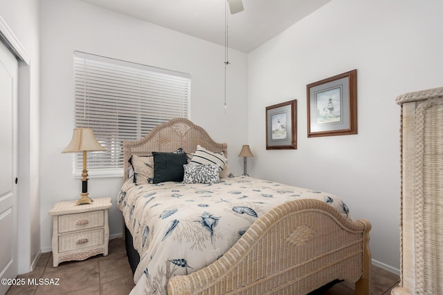 5884 S Azure Vista Way, Green Valley, AZ 85622 - bedroom featuring a closet, baseboards, and tile patterned flooring