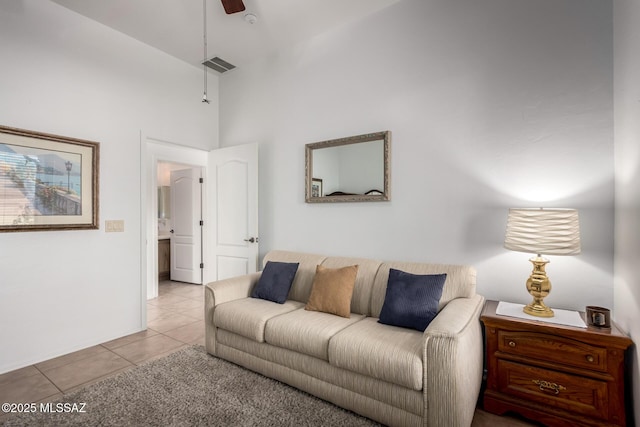 5884 S Azure Vista Way, Green Valley, AZ 85622 - living room featuring tile patterned flooring, a high ceiling, and ceiling fan