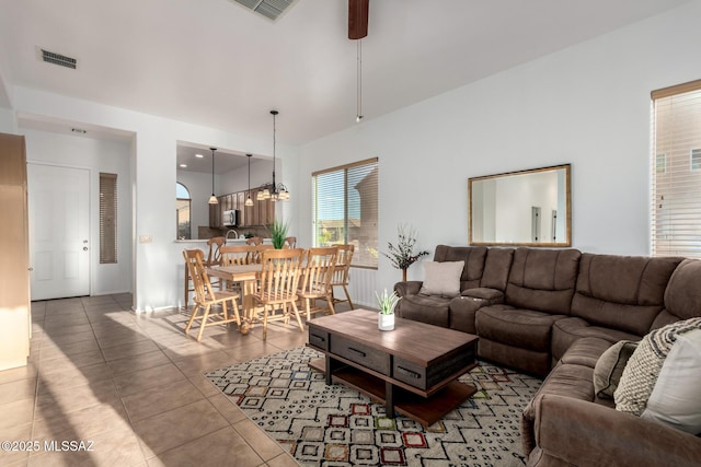 5884 S Azure Vista Way, Green Valley, AZ 85622 - tiled living area with a ceiling fan