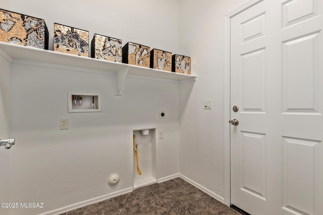 laundry area with laundry area, washer hookup, baseboards, hookup for a gas dryer, and electric dryer hookup