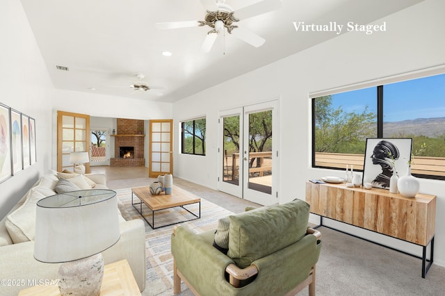 12471 E Speedway Blvd, Tucson, AZ 85748 - carpeted living area with ceiling fan, recessed lighting, and a brick fireplace