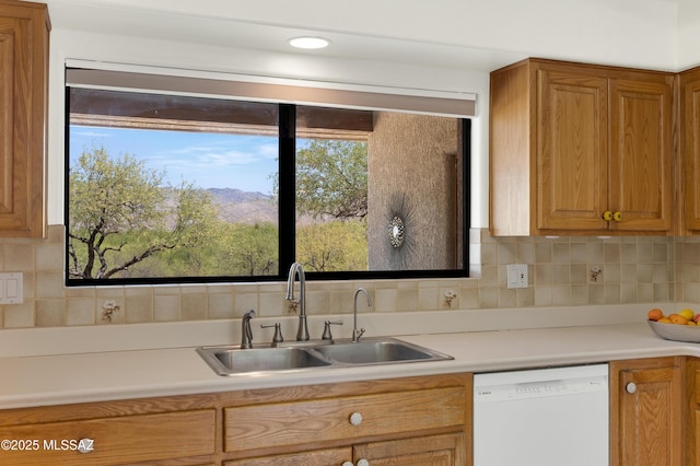 12471 E Speedway Blvd, Tucson, AZ 85748 - kitchen with dishwasher, light countertops, and tasteful backsplash