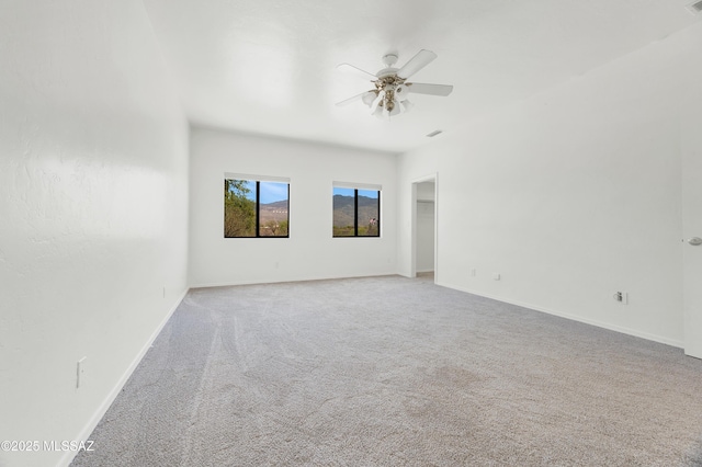 12471 E Speedway Blvd, Tucson, AZ 85748 - spare room featuring carpet flooring and a ceiling fan