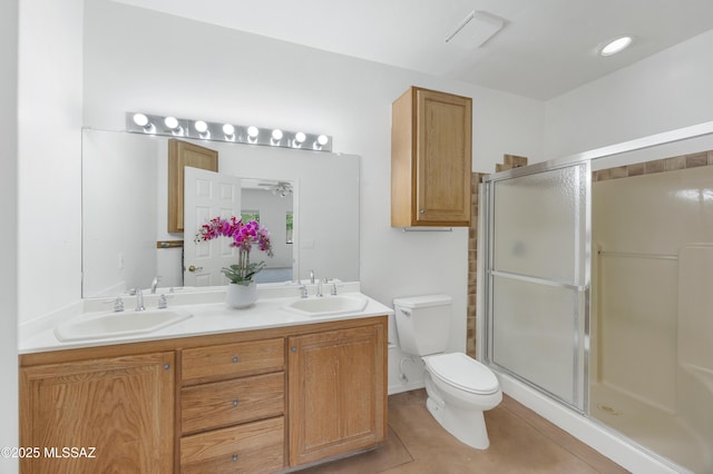 12471 E Speedway Blvd, Tucson, AZ 85748 - full bathroom with double vanity, a stall shower, and tile patterned floors