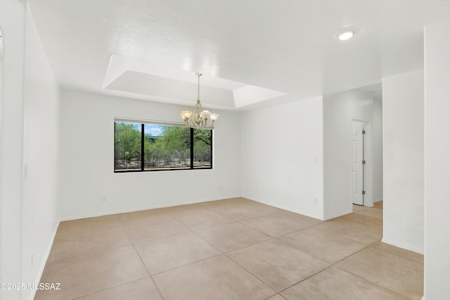 12471 E Speedway Blvd, Tucson, AZ 85748 - unfurnished room with a chandelier, light tile patterned floors, and a tray ceiling