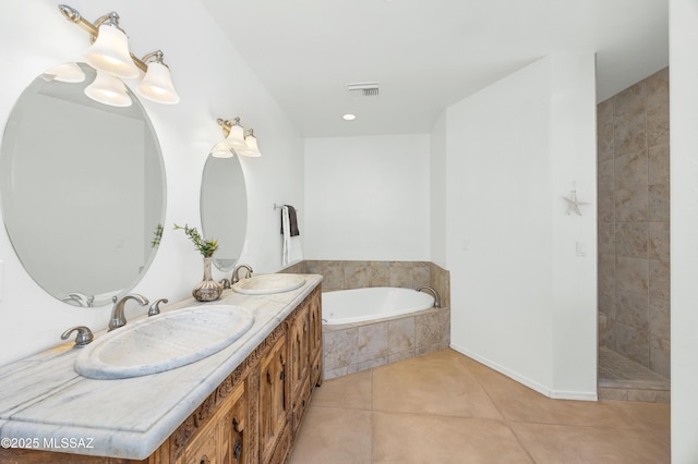 12471 E Speedway Blvd, Tucson, AZ 85748 - full bath featuring a bath, tile patterned flooring, double vanity, and a tile shower