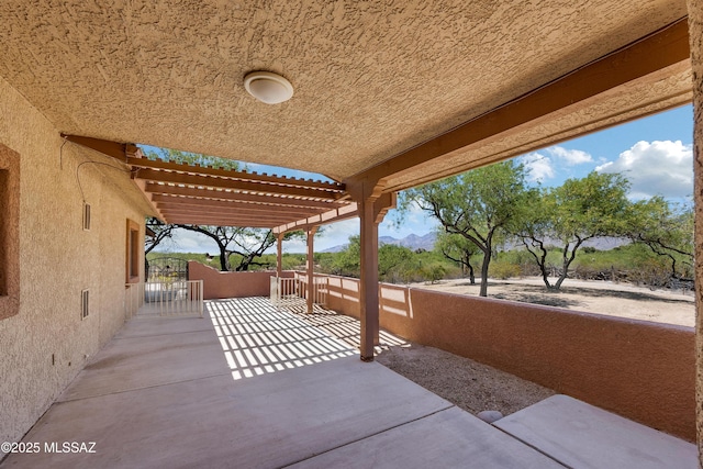 12471 E Speedway Blvd, Tucson, AZ 85748 - view of patio featuring a gate and a mountain view