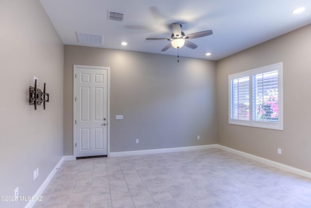 spare room featuring visible vents, baseboards, a ceiling fan, and recessed lighting