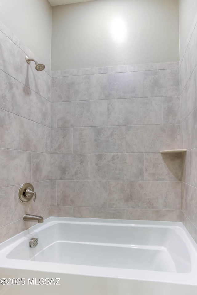 bathroom with shower / bathtub combination