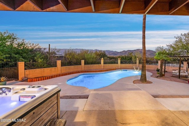 900 N Camino Del Codorniz, Tucson, AZ 85749 - view of pool featuring a mountain view, a patio, and a fenced backyard