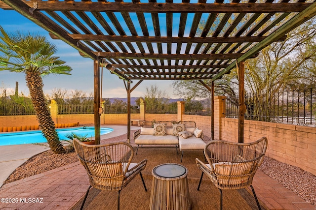 900 N Camino Del Codorniz, Tucson, AZ 85749 - fenced backyard with a pergola, a patio, an outdoor living space, and a mountain view