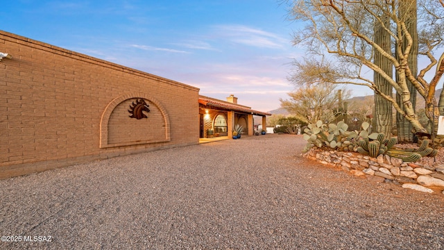 900 N Camino Del Codorniz, Tucson, AZ 85749 - exterior space with a chimney