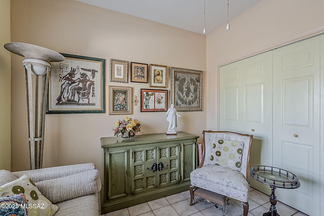 sitting room with light tile patterned floors
