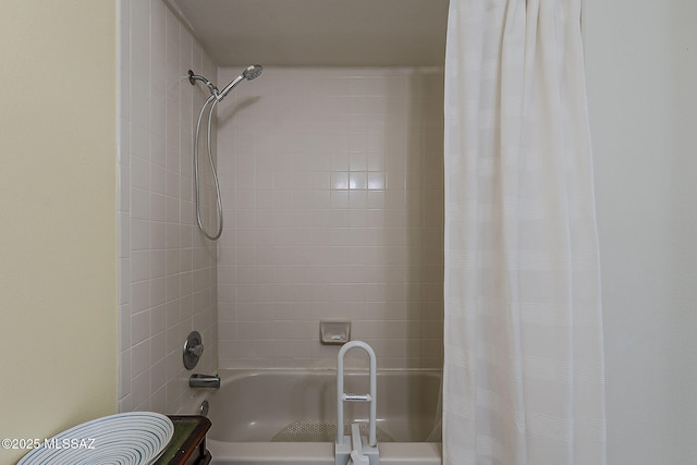 bathroom with shower / bath combo with shower curtain and toilet