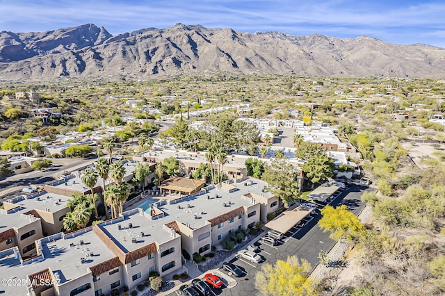 drone / aerial view featuring a residential view and a mountain view