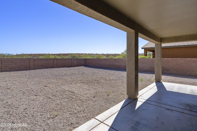 view of patio with a fenced backyard