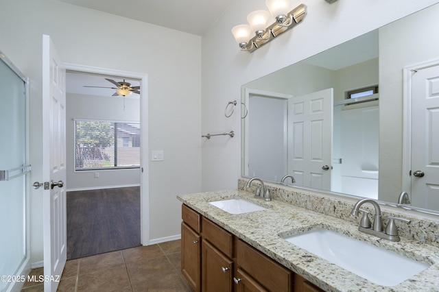 493 E Placita Nodo, Sahuarita, AZ 85629 - full bathroom with tile patterned flooring, a sink, baseboards, and ceiling fan