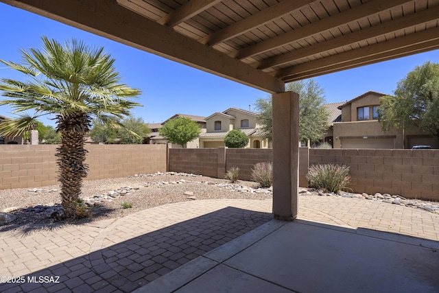 493 E Placita Nodo, Sahuarita, AZ 85629 - view of patio featuring fence and a residential view