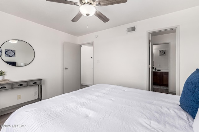 bedroom featuring visible vents, ensuite bathroom, and ceiling fan
