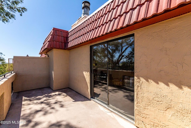 view of patio / terrace featuring a balcony