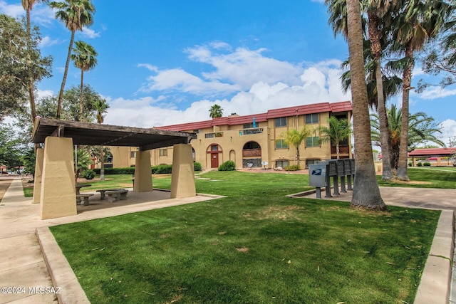 6311 N Barcelona Ct Unit 1023, Tucson, AZ 85704 - view of home's community featuring a yard and mail area