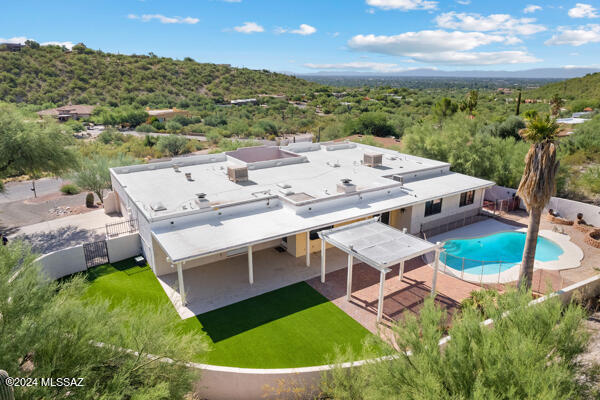 4361 N Wilmot Rd, Tucson, AZ 85750 - birds eye view of property with a forest view