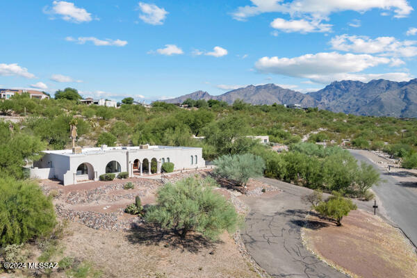 4361 N Wilmot Rd, Tucson, AZ 85750 - exterior space with stucco siding and a mountain view