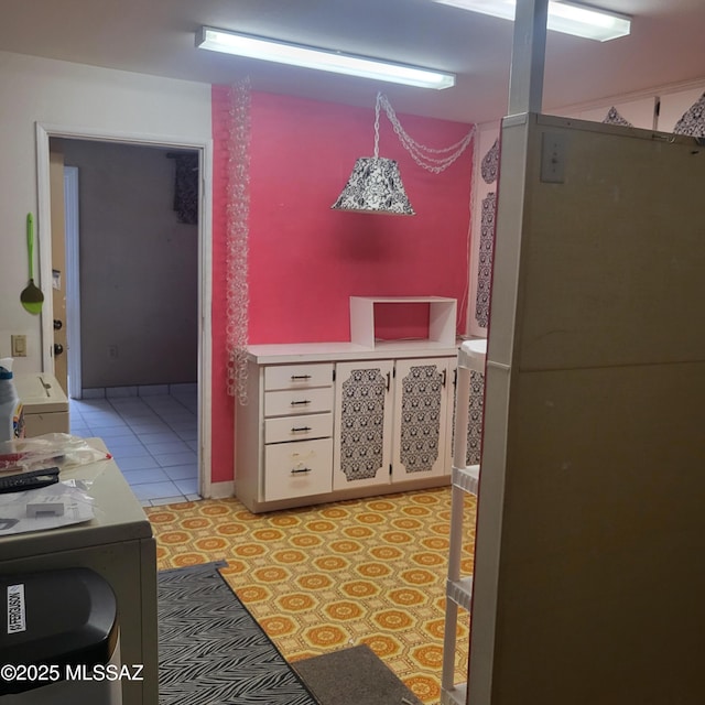 interior space featuring light tile patterned flooring