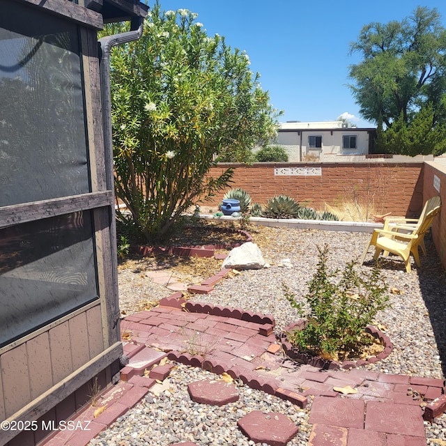 view of yard with fence