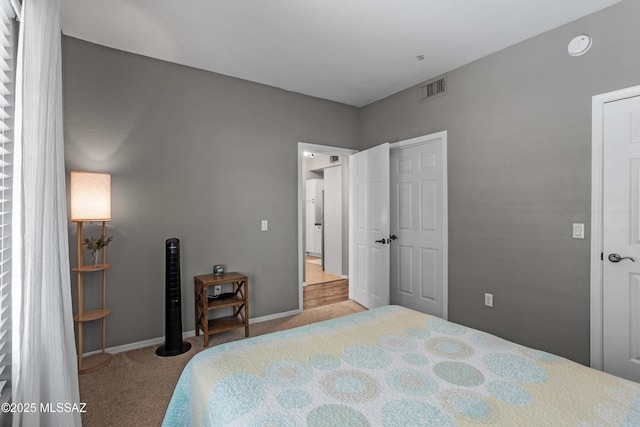1500 E Pusch Wilderness Dr Unit 10105, Oro Valley, AZ 85737 - carpeted bedroom featuring baseboards