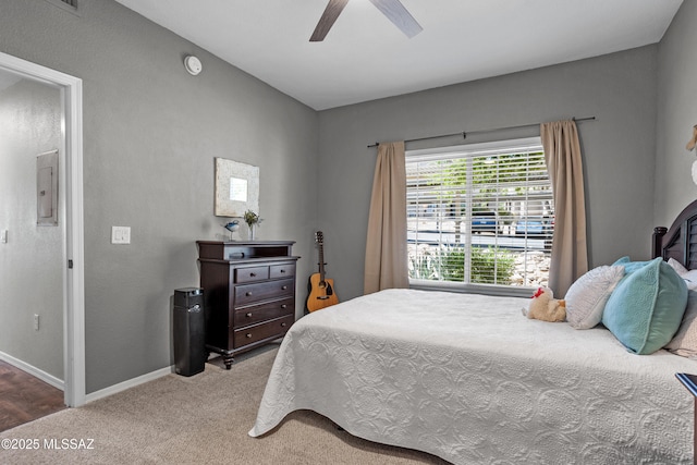 1500 E Pusch Wilderness Dr Unit 10105, Oro Valley, AZ 85737 - carpeted bedroom with baseboards, electric panel, and a ceiling fan