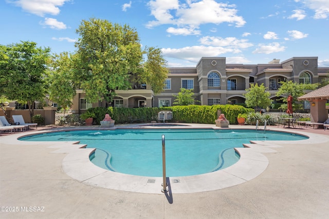 1500 E Pusch Wilderness Dr Unit 10105, Oro Valley, AZ 85737 - community pool with a patio area
