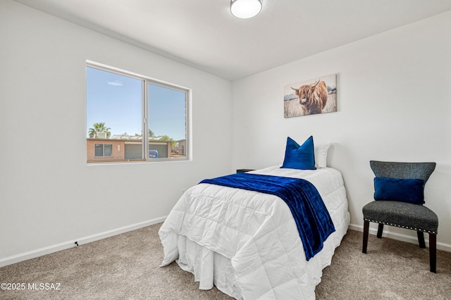 7555 E 25th St, Tucson, AZ 85710 - carpeted bedroom featuring baseboards