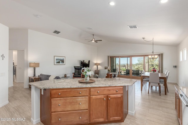 13795 N Buckhorn Cholla Dr, Marana, AZ 85658 - kitchen with open floor plan, lofted ceiling, baseboards, hanging light fixtures, and a chandelier