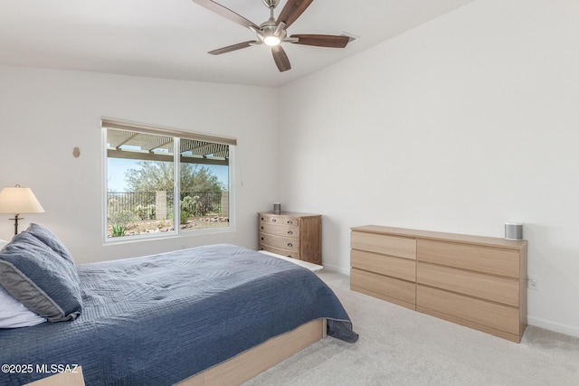 13795 N Buckhorn Cholla Dr, Marana, AZ 85658 - bedroom featuring light carpet, baseboards, and a ceiling fan