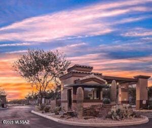13795 N Buckhorn Cholla Dr, Marana, AZ 85658 - view of property at dusk