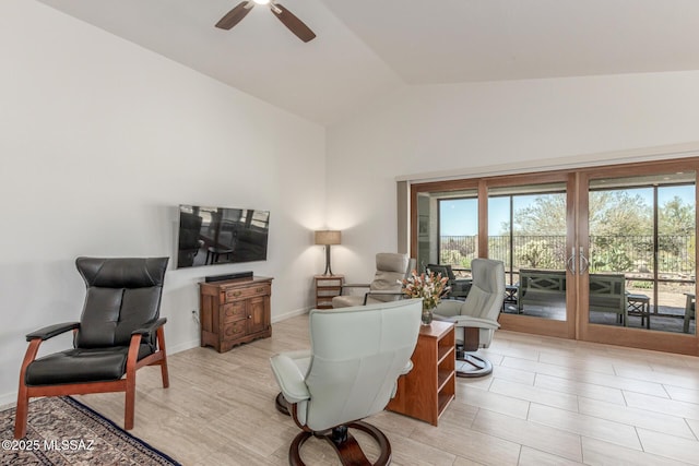 13795 N Buckhorn Cholla Dr, Marana, AZ 85658 - living room with vaulted ceiling, healthy amount of natural light, ceiling fan, and light wood-style floors