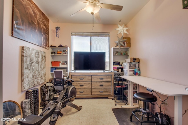 interior space with ceiling fan and light carpet