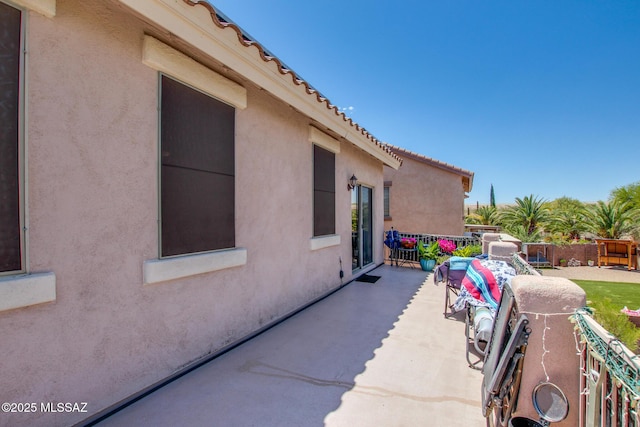 view of patio / terrace with fence