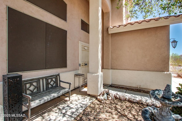 exterior space featuring stucco siding