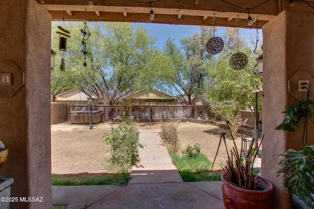 view of yard featuring a fenced backyard and a patio area
